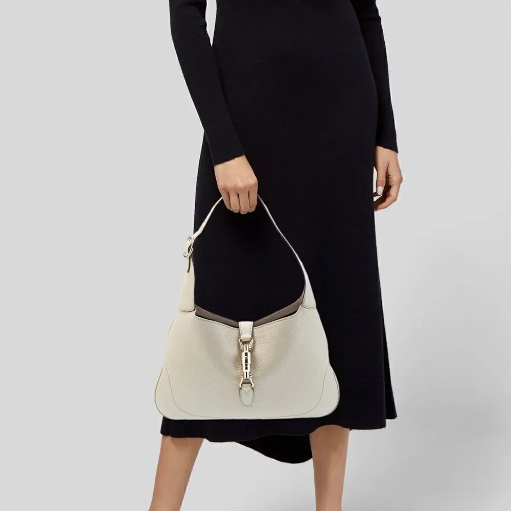 Gucci beiges leather Jackie bag with silver piston lock